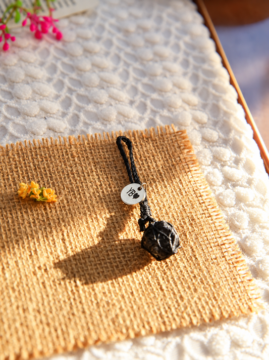 Handmade black obsidian pet pendant with black waxed cord and a round personalized metal tag