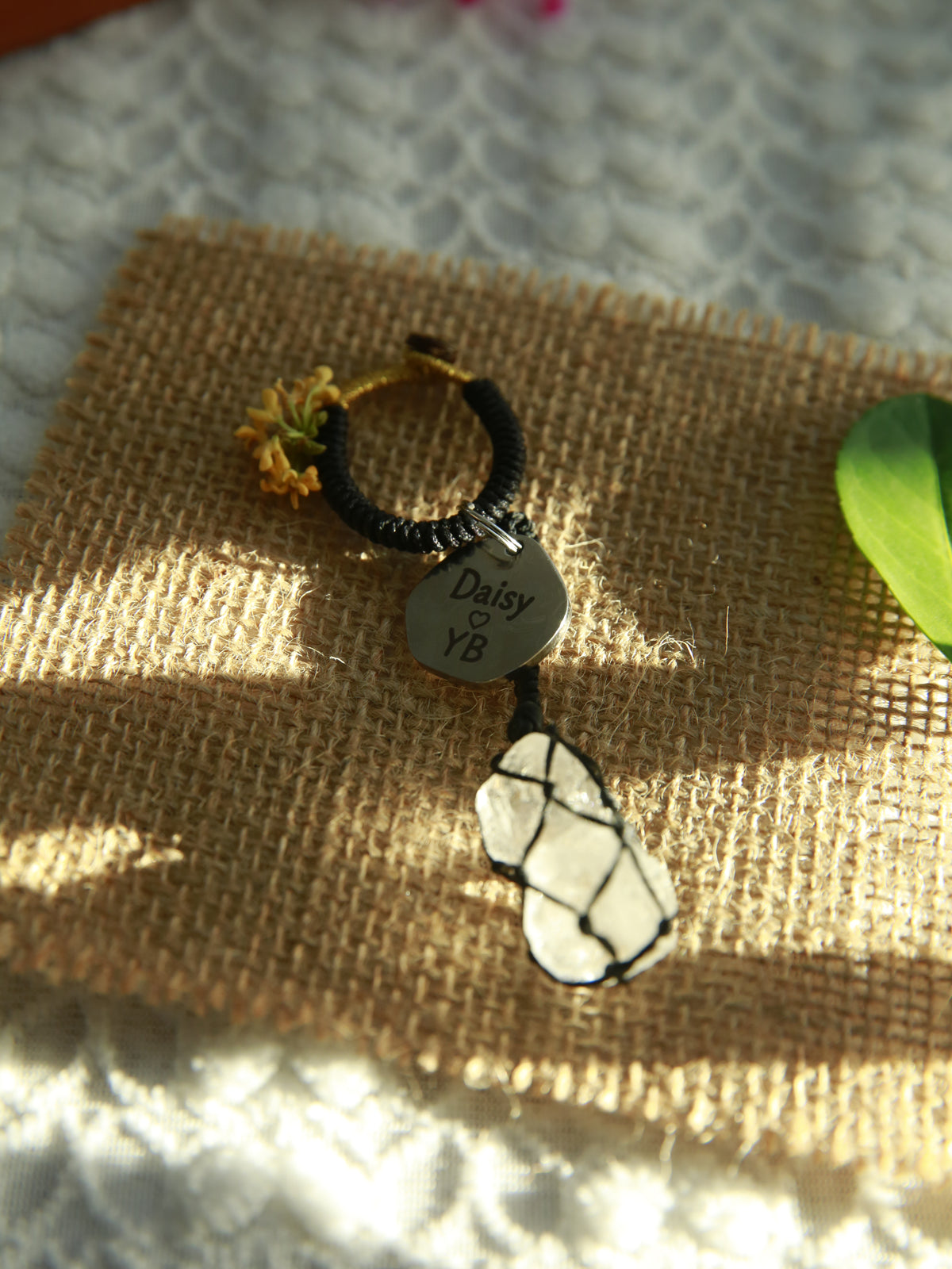 Black double Clear Quartz bag and key charm with two raw stones together in one waxed cord net